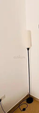 Slim black floor lamp with fabric shade