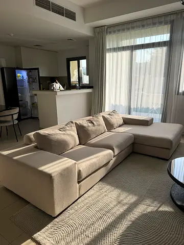 Light beige L-shaped sectional sofa