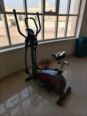 Used upright exercise bike with elliptical handles - good working condition