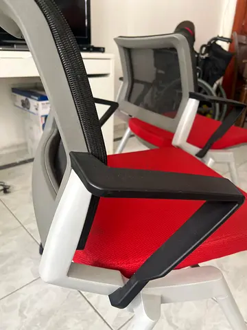 Set of modern red mesh office chairs — good condition 2 sets for 100 dirhams