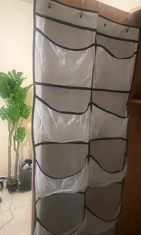 Hanging Closet Organizer with Multiple Mesh Pockets Original Price 50 dhs Selling For 25 dhs 2 piece
