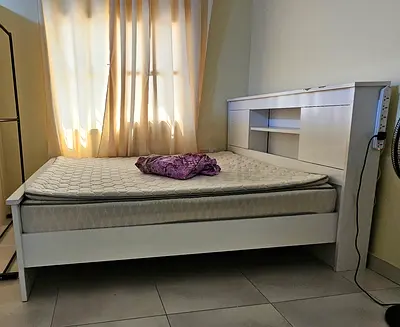 White wooden single bed frame with headboard storage + mattress
