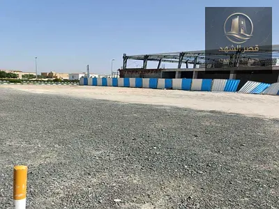 للبيع ارض في منطقة الصناعية ١٨ مساحة 12920 قدم مربع موقع مميز عالشارع