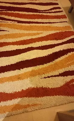 Used Shaggy Area Rug - Abstract Striped Design (Beige, Orange, Brown)