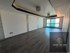 2BR + Hall for Annual Rent in Corniche Towers, Ajman | Prime Location | Spacious Layout with City‑