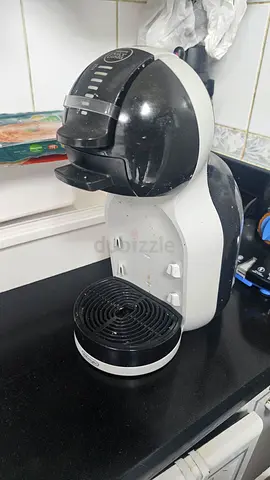 Nescafe Delonghi dolce gusto expresso machine with reusable coffee pod and grounds distributor