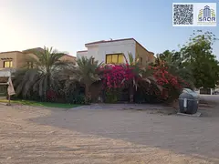 Luxury villa in a corner location for sale, price includes electricity, water, and air conditioning.