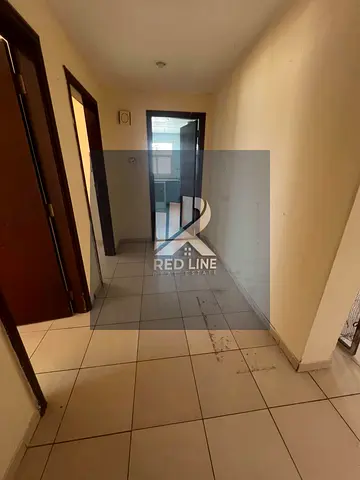 2-bedroom apartment for rent in Al Mareija with a prime location and beautiful sea view. Features a spacious balcony, central AC, and central gas, alo