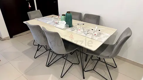 Modern 6-Seater Dining Table with Grey Velvet Chairs