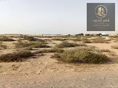 Land for sale in Sharjah, in Rawdat Al Qurt area, measuring 7360 square feet, prime location.