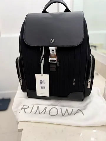 Rimowa Black Rimowa Backpack with Leather Flap and Side Pockets