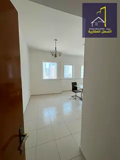 Spacious 2-Bedroom Apartment for Rent in Al Taawun with parking