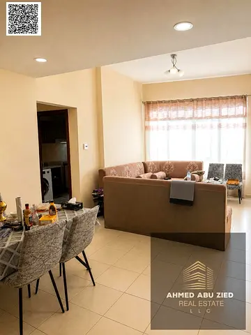 Beautiful two-bedroom apartment with a living room in the Garden City Towers, Al Hamidiya, furnished or unfurnished, two bathrooms, 36,000 only