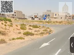Residential land for sale in Al-Helio 1 area | Fees included | Large setback | On the main street