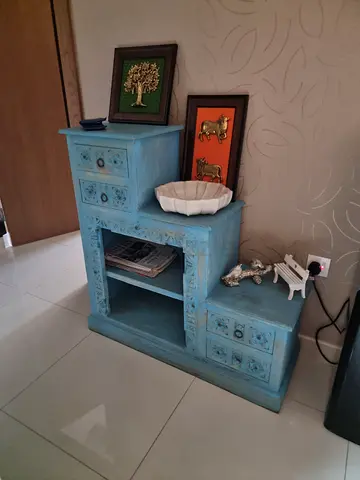 Blue distressed wooden bcabinet with drawers and shelf