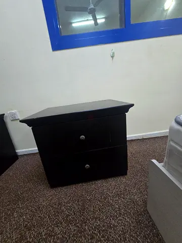 Black bedside nightstand with two drawers