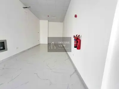 Title: 650 Sqft Commercial Shop for Rent in Hoshi | Prime Main Road Location | AED 60,000/year