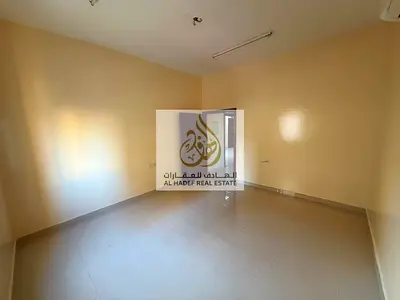 For annual rent in Al Alia, Ajman: spacious studio apartment with a separate kitchen, located next to Sheikh Mohammed Bin Zayed Road and close to all