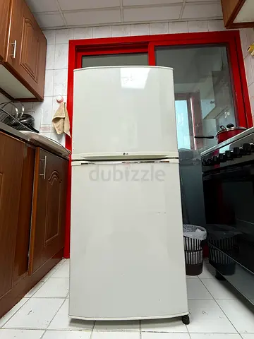 Used white double-door fridge - working condition