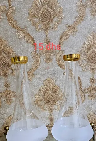 Pair of decorative glass vases with gold rim - lightly used