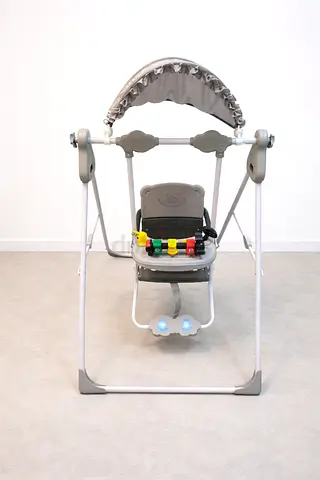 Portable Baby Swing with Toy Bar and Canopy - New Condition