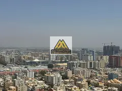 Prime Location with Direct Access to Sharjah &amp; Dubai Exit | High Floor with Open View | 2 Balcon