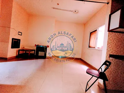 Spacious Studio with separate kitchen big space , central AC close to road in muwaileh