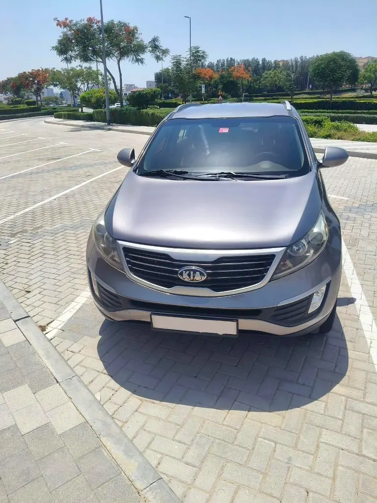 Kia Sportage 2013 — photo 1 of 9