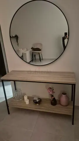Slim console table with lower shelf and black metal frame