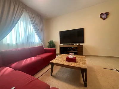 Red L-shaped Sofa - Good Condition