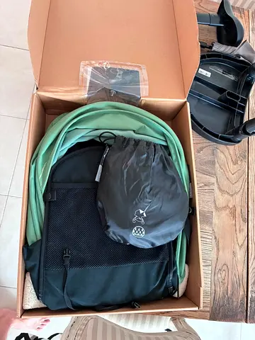 Two yo-yo strollers Lightly used with full accessories - green and grey,