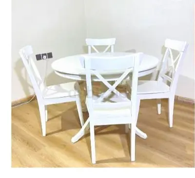 White Round Dining Table with 4 Cross-back Chairs - Compact Set