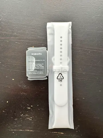 White Xiaomi smartwatch band with charger (new)