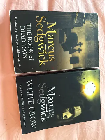 Two Marcus Sedgwick novels — The Book of Dead Days  White Crow (paperbacks)