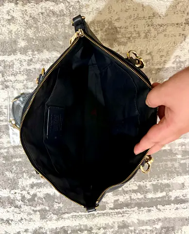 Black leather shoulder bag with gold hardware - good condition