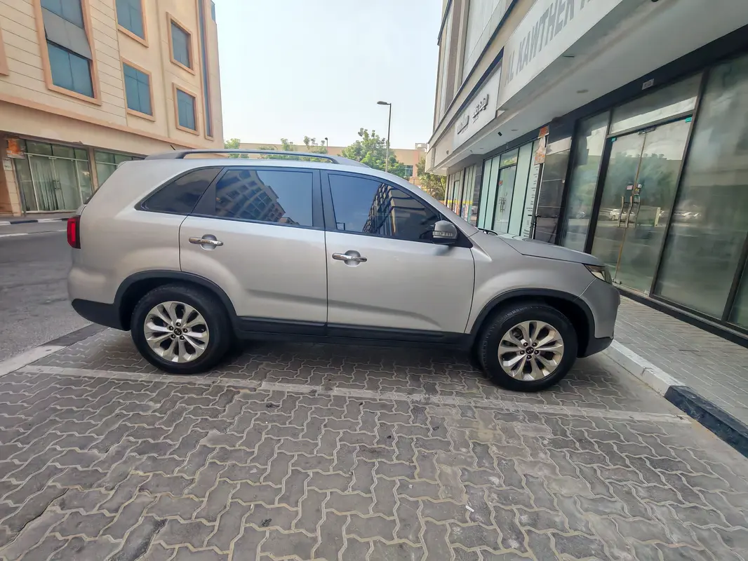 Kia Sorento 2015 — photo 1 of 8