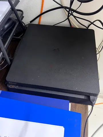 PS4 Slim black 1TB + 1 Controller + 4 Games (FC 24 included)