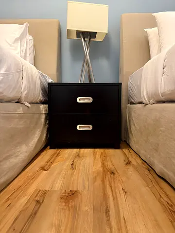Dark wood two-drawer bedside table/nightstand in good condition