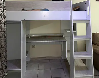 White loft bed with built-in desk and shelves — good condition