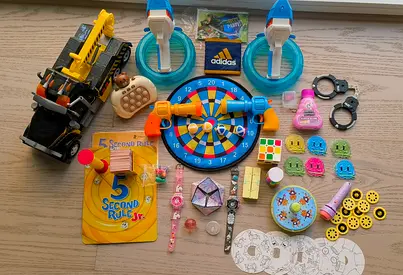 Mixed kids toys bundle — games, a gifeez cartoon maker, toys, an adidas wallet, water guns ect.