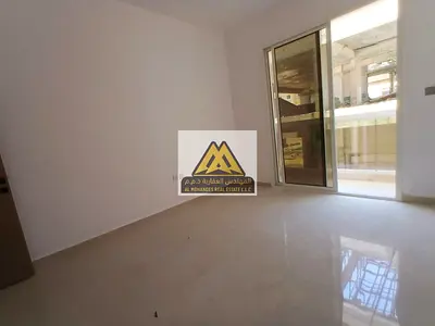 A spacious one-bedroom apartment with a practical layout, featuring a balcony with a pleasant view and central air conditioning. The property is loca