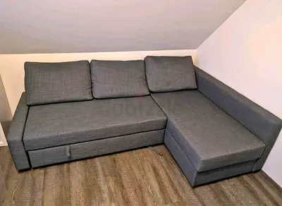 Grey L-shaped Sofa Bed — Good Condition