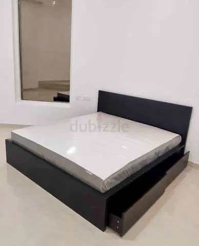 ikea malm king bed with ikea firm mattress   having 2 storage units under the bed
