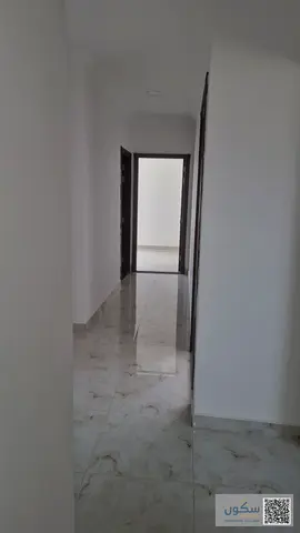 **Three-Bedroom Apartment with Living Room for Annual Rent in Al Alia on Sheikh Mohammed Bin Zayed Road – Second Tenant.**