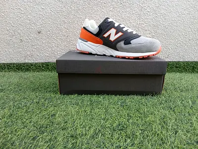 New Balance mens sneakers, size (see details) — grey/navy with orange accents