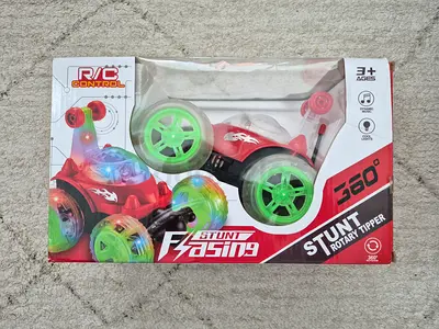 Remote Control Stunt Car - 360° Rotating Tipper with LED Lights and Music
