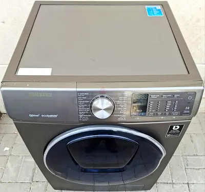 This Samsung Premium 9kg washing machine with 6kg full dryer, good working