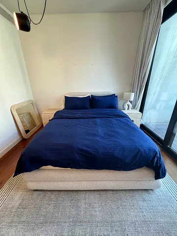Queen upholstered bed with mattress and nightstand - good condition