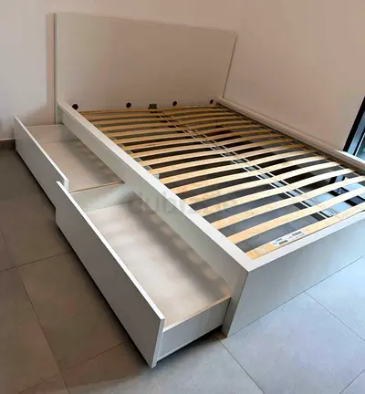 l brimness  Day bed with 2 storage drawers underneath and with 2 IKEA mattresses is available