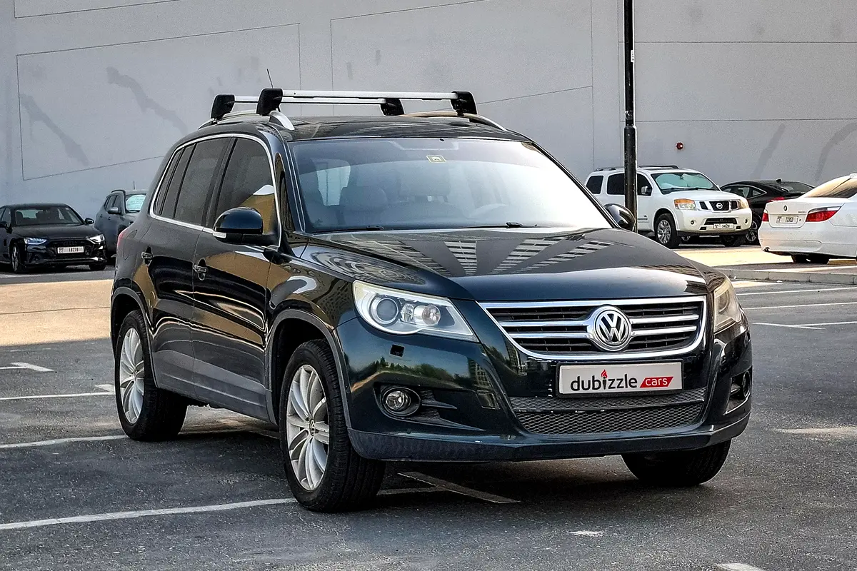 Volkswagen Tiguan 2011 — photo 1 of 14